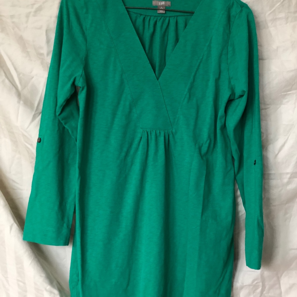 A green pullover top